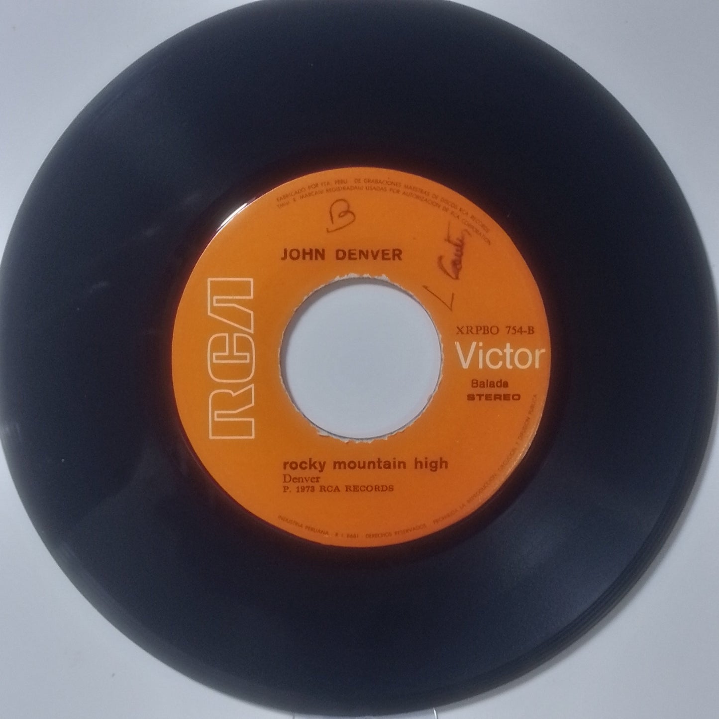 single 7" John Denver Sunshine On My Shoulders / Rocky Mountain High made peru 1973 country