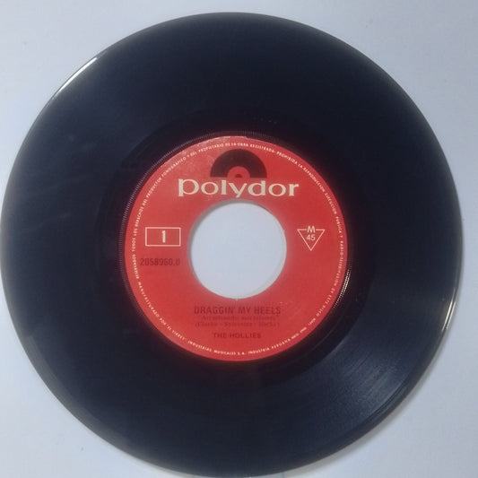 single 7" The Hollies Draggin' My Heels / Daddy Don't Mind made Peru 1976 rock
