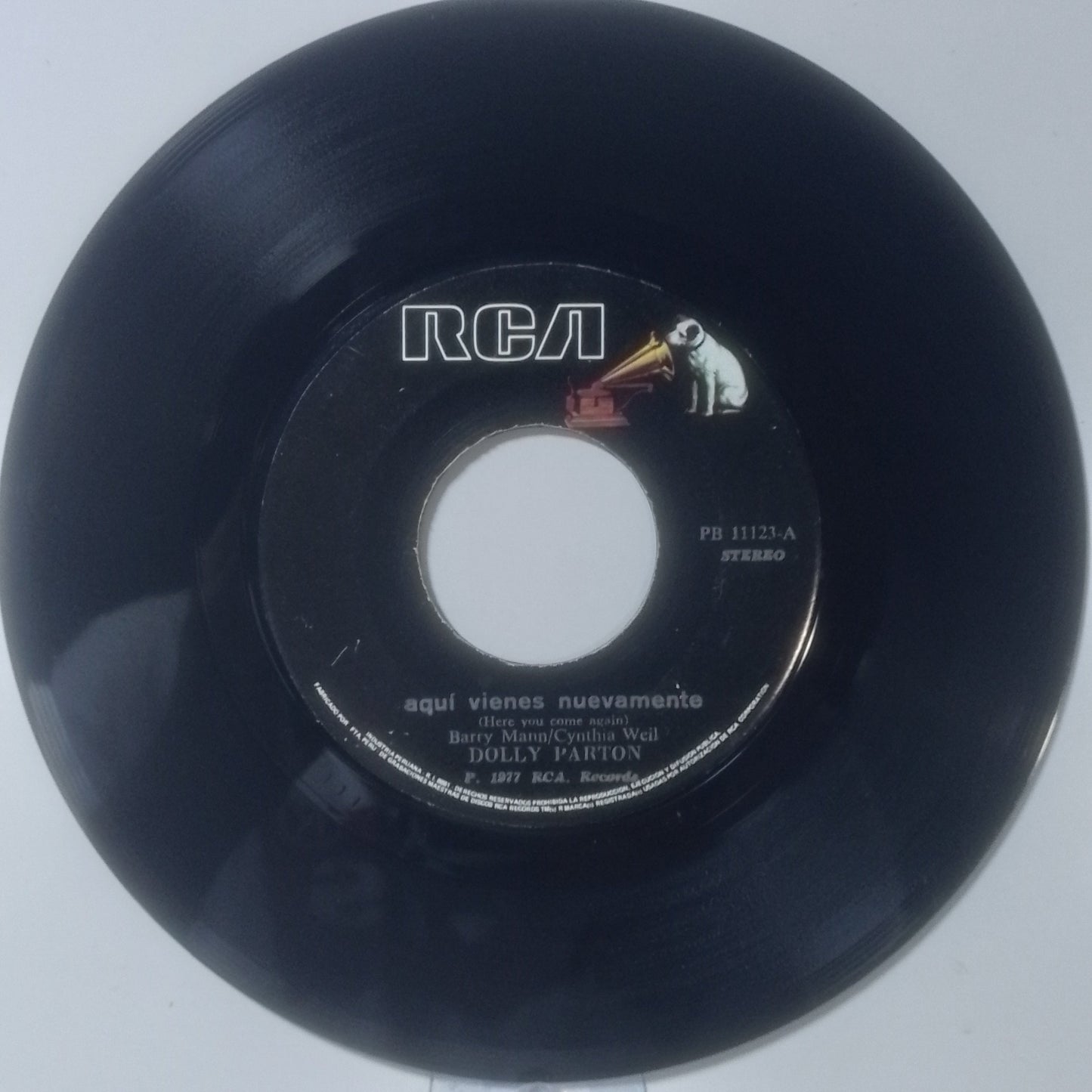 single 7" Dolly Parton Here You Come Again / Me and Little Andy made peru 1977 country